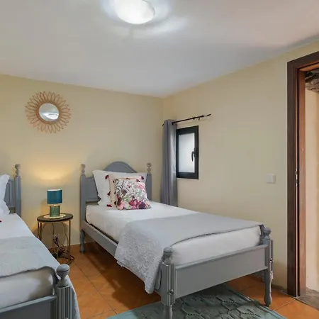 Arco De Sao Jorge By An Island *