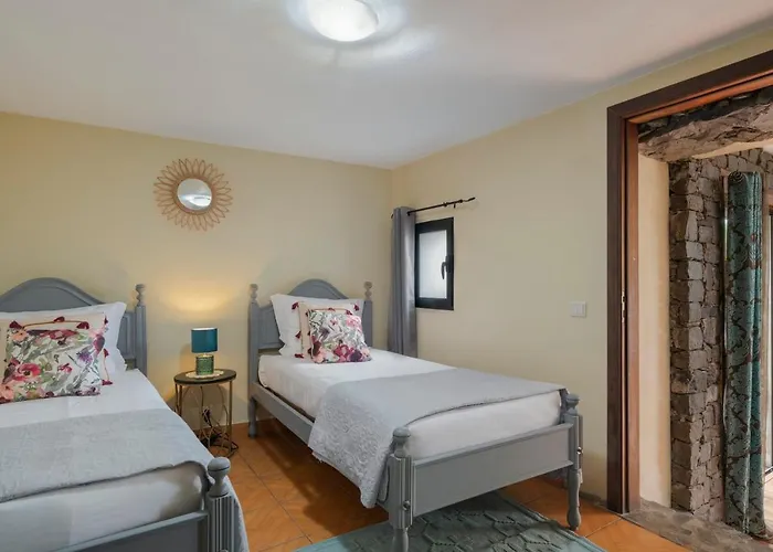 Arco De Sao Jorge By An Island *